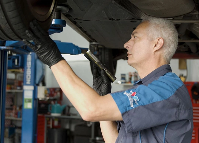 Auto Super Shoppes mechanic carrying out a Warrant of Fitness inspection